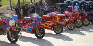 A lineup of iconic Ducati TT and F1 race bikes on display at Barber Motorsports Park. Photo credit Mike Weber.