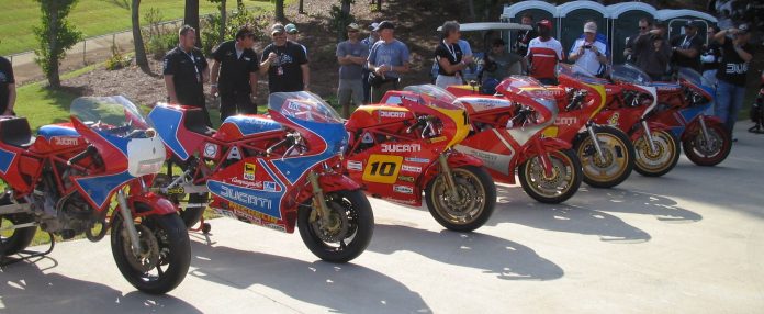 A lineup of iconic Ducati TT and F1 race bikes on display at Barber Motorsports Park. Photo credit Mike Weber.