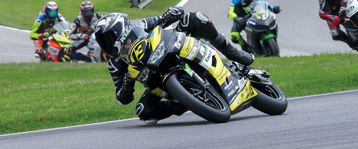 Jayden Fernandez (13) during a MotoAmerica Junior Cup race at Barber in 2024. Photo by Brian J. Nelson.