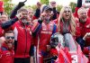 The Honda Racing team and Dean Harrison celebrating his victory at the Isle of Man TT.