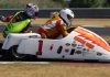 A vintage sidecar racing team.