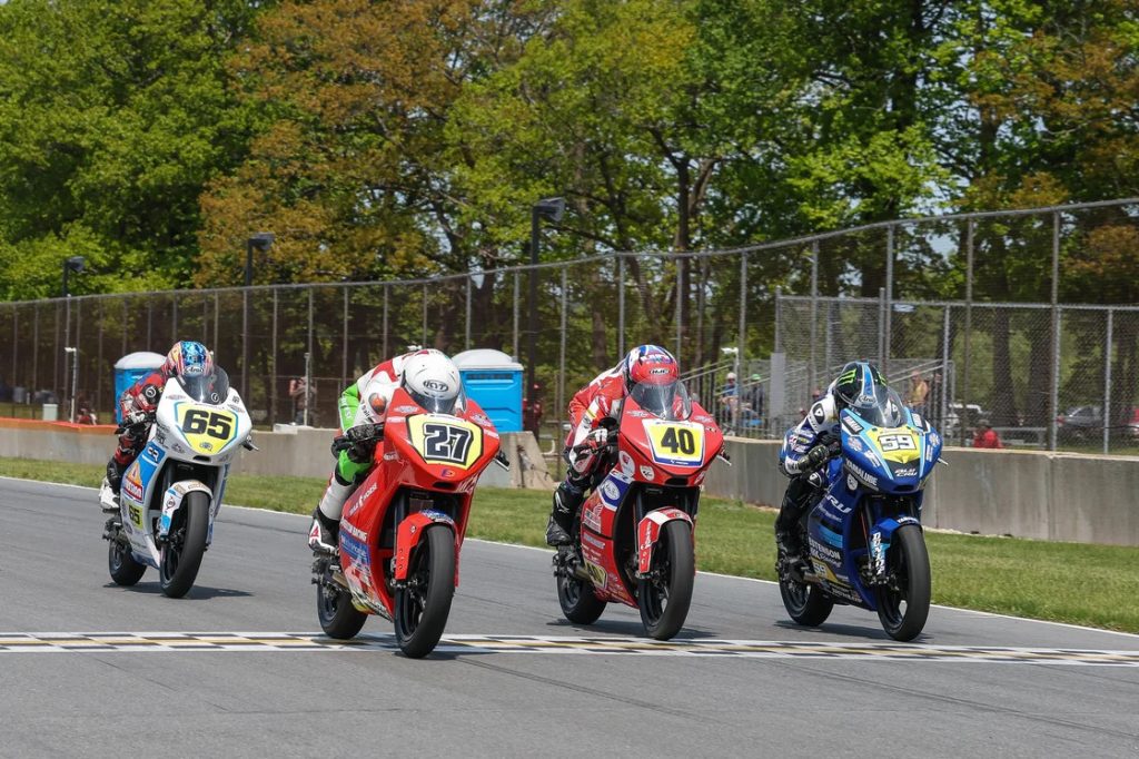 How close is close? Alessandro Di Mario (27) barely beat Julian Correa (40), Sam Drane (59) and Bodie Paige (65) in Sunday's Parts Unlimited Talent Cup By Motul race. Photo by Brian J. Nelson