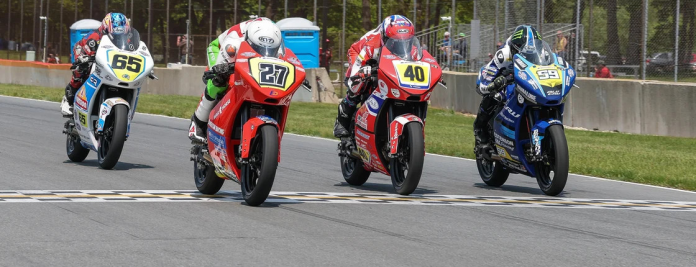 How close is close? Alessandro Di Mario (27) barely beat Julian Correa (40), Sam Drane (59) and Bodie Paige (65) in Sunday's Parts Unlimited Talent Cup By Motul race. Photo by Brian J. Nelson