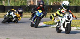 Practice action for the opening FIM World Final MiniGP qualifying event at Brechin Motorsport Park, with the No. 152 REV Scholarship Ohvale of Tommy Molnar leading No. 111 Surge Racing entry of Eric Sergi and the No. 91 of Ethan Reardon. Molnar crashed early in the second of two Qualifying sessions, and required medical attention before rain arrived and forced cancellation of the event. Unfortunately, Molnar was slated to be one of the young racers representing Canada at an invitational event in China this week.