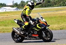 Royal Distributing/Dunlop/Bell supported BMW Motorrad racer Michael Leon celebrates his strong weekend at Shannonville Motorsport Park’s third round of the RACE Moto Regional tour, July 6. Image by Don Empey.