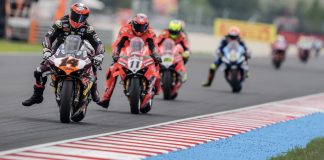 Sam Lowes (14) and Nicolo Bulega (11) during WSBK race 2 at Balaton Park. Photo courtesy Dorna.