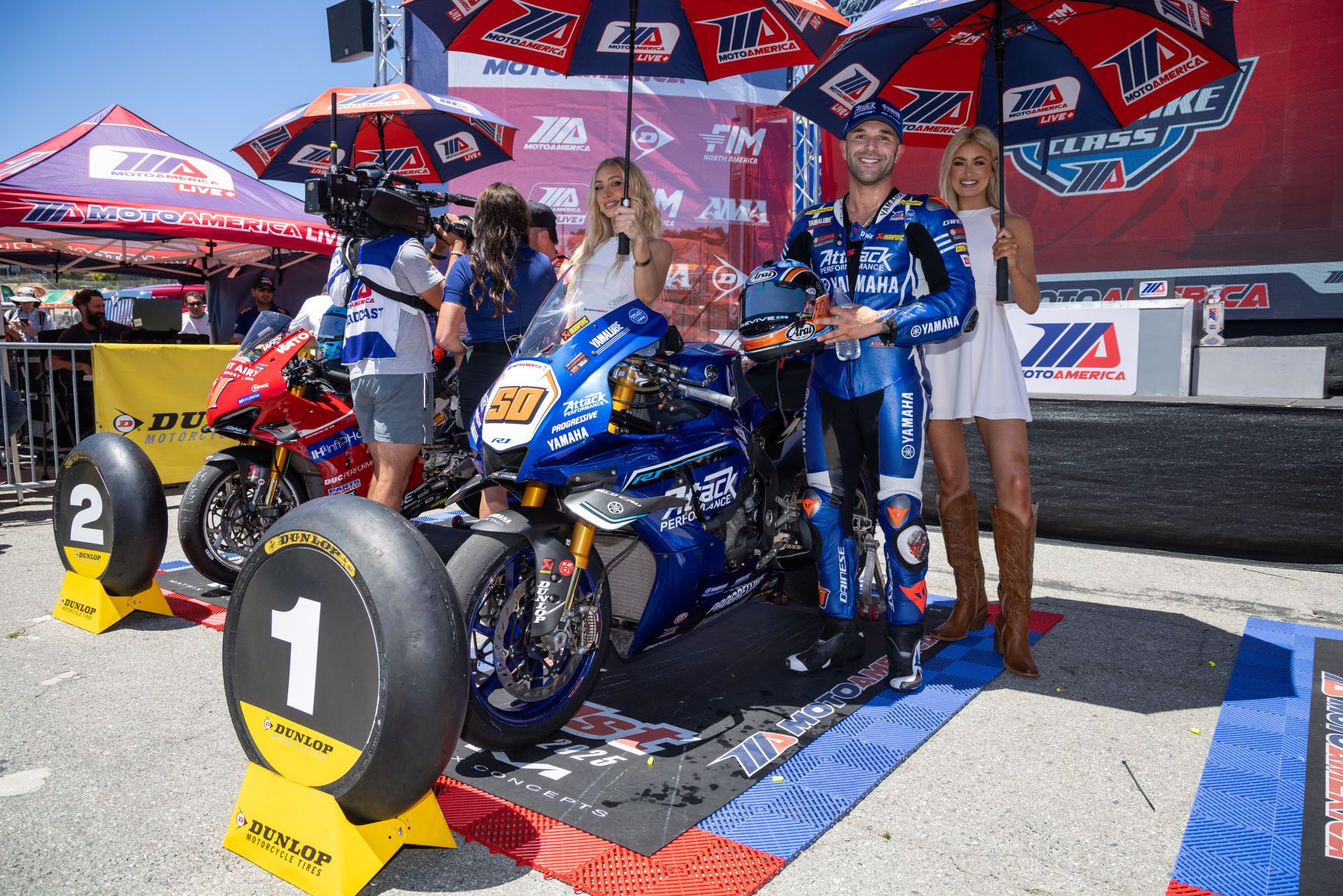 Bobby Fong in Parc fermé after his victory at Laguna Seca. Photo by Andrea Wilson.