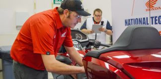 Honda National Technician Contest Returns for Year Two A Honda technician demonstrates skill and focus during the National Technician Contest. Photo courtesy American Honda Motor Co.