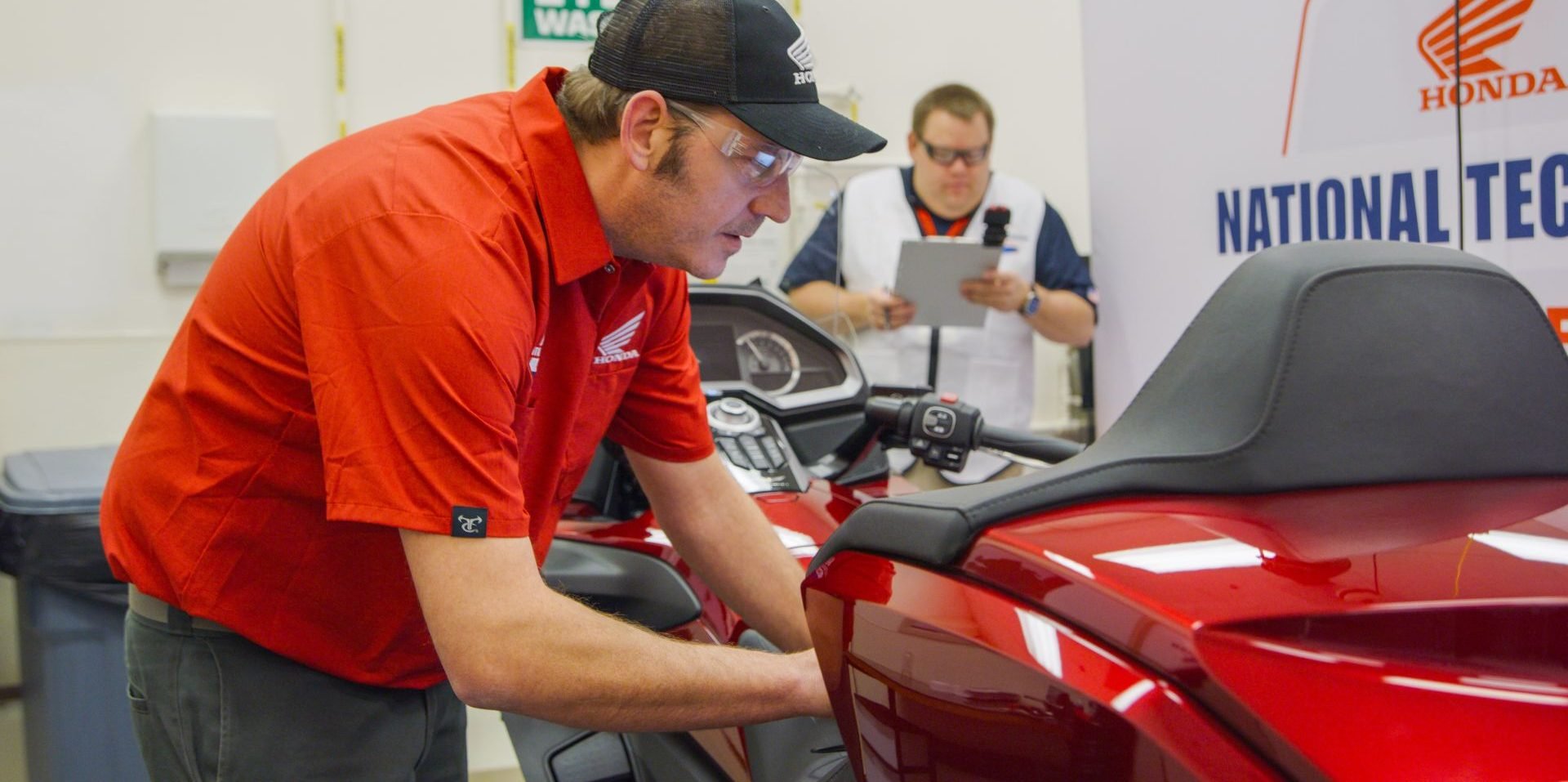 A Honda technician demonstrates skill and focus during the National Technician Contest. Photo courtesy American Honda Motor Co.