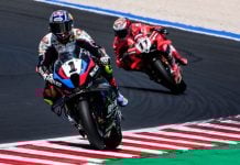 Toprak Razgatlioglu on his ROKiT BMW Motorrad WorldSBK Team (1) and Nicolo Bulega on his Aruba.it Racing - Ducati (11). Photo courtesy Dorna.