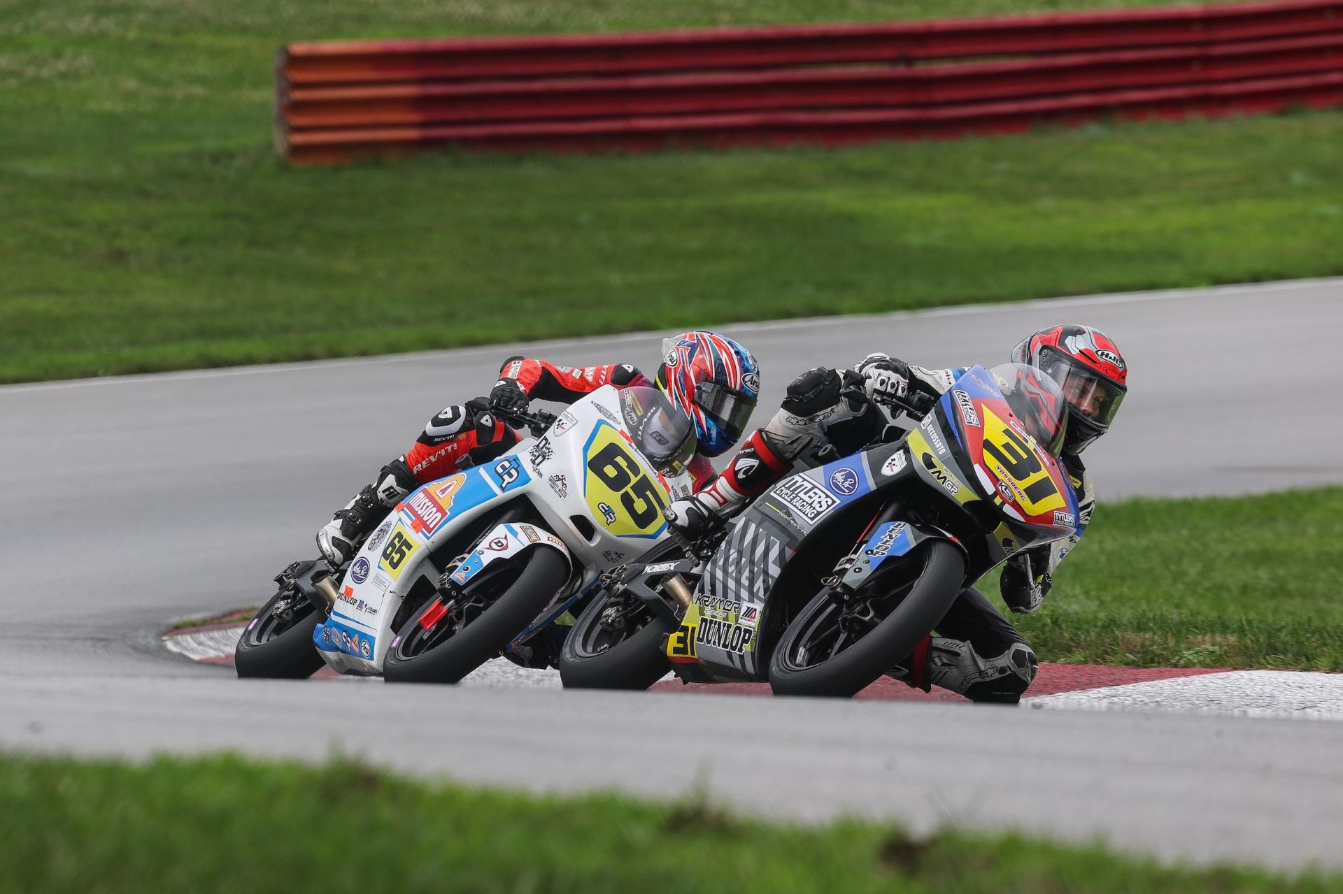 The battle for victory came down to Hank Vossberg (31) vs. Bodie Paige (65) with Vossberg earning his second win of the season by less than a second in the red-flag shortened race. Photo By Brian J. Nelson