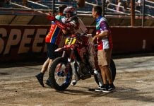 Trevor Brunner (21) celebrates winning the AFT Singles presented by KICKER class Main Event at Lucas Oil Speedway on July 18 Photo by: Kristen Lassen / courtesy American Flat Track.