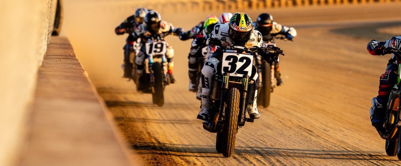 Dallas Daniels (32) races down the straightaway ahead of other Mission AFT SuperTwins riders at the DuQuoin Mile. Photo credit: Tim Lester / courtesy American Flat Track.