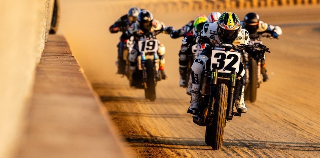 Dallas Daniels (32) races down the straightaway ahead of other Mission AFT SuperTwins riders at the DuQuoin Mile. Photo credit: Tim Lester / courtesy American Flat Track.