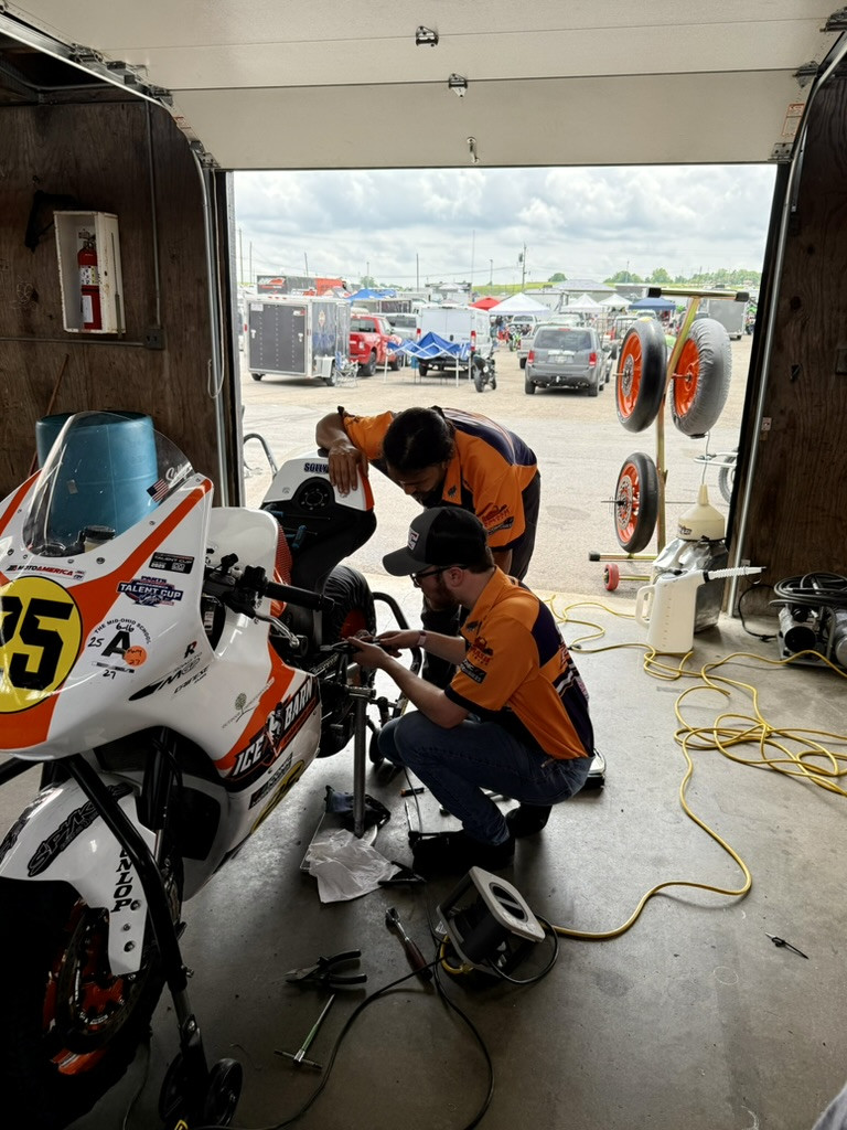 Ayden Snedigar (kneeling) and Thornton Thomas are applying their motorsports engineering prowess to the Ice Barn Racing Team. Photo courtesy of Ice Barn Racing