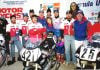 1993 Formula USA Feature race podium on Halloween at Road Atlanta, GA, with the Barely Human entered Yamaha effort of Fast Company and associates (Left to Right): and Fred Burchill, Trevor Weiles (eventual factory Honda USA race Tech), Peter Newfeld, builder Scott Miller (Class of 2025), Fred Kling, Tina Kling, Rob Stoeser, rider (the late) Fritz Kling, bike owner Doc Mark Brubacher, EBC Brakes Rep Gary Gallagher. (Chuck Graves in hat with Suzuki to left and the late Mike Velasco on Sadowski Honda to right). Photo by Colin Fraser.