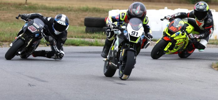 Lap one, race one, turn one for the Motul MiniGP Canadian National opener at Lombardy, with the Ohvale 160s of No. 91, Ethan Reardon; No. 68, Jager Stockill and No. 15, Stfan Tanasic – these three would control the podium spots.