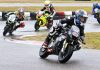Race one of three, lap one, in the wet Motul FIM MiniGP Canada round two at Le Circuit Mont Tremblant in Quebec, and eventual triple winner No. 68 Jager Stockill, No. 91 Ethan Reardon, No. 15 Stefan Tanasic and No. 20 Martina Cardenas. Eventually earning third, Cardenas made history as the first female to earn the podium at a Mini National round. Photo courtesy Colin Fraser.