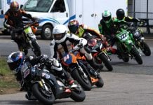 Lap one, turn one of the Moto4 Feature MiniSBK event with the No. 68 613 Cycle Ohvale 160 of eventual winner Jager Stockill leading No. 84 YCF190 of Ben Hodgson, No. 213 Bucci 190 of Jan Massignani, No. 222 Kawasaki KX112 two-stroke of Chelsea Baursier, No. 88 YCF190 of Jacob Abnett, No. 21 Bucci 190 Yan Boursier by CF April 2. Photo courtesy CSBK.