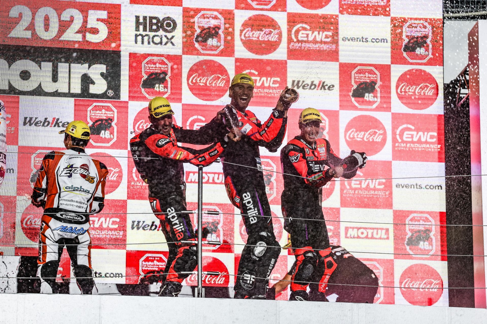 Kevin Calia, Simone Saltarelli, and Flavio Ferroni on the Superstock podium. Photo courtesy Aprilia Racing.