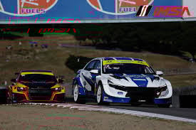 Get your knee down, Larry! Pegram currently also races in IMSA with his daughter Riley in a Hyundai Elantra N.
