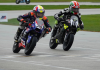 Kensei Matsudaira (74), making his final Mini Cup appearance, nips rival Mahdi Salem (10) at the finish line in Sunday’s final GP 190 race. Matsudaira won back the title that Salem took at the championships in 2024. Photo by Larry Lawrence