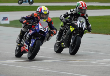 Kensei Matsudaira (74), making his final Mini Cup appearance, nips rival Mahdi Salem (10) at the finish line in Sunday’s final GP 190 race. Matsudaira won back the title that Salem took at the championships in 2024. Photo by Larry Lawrence