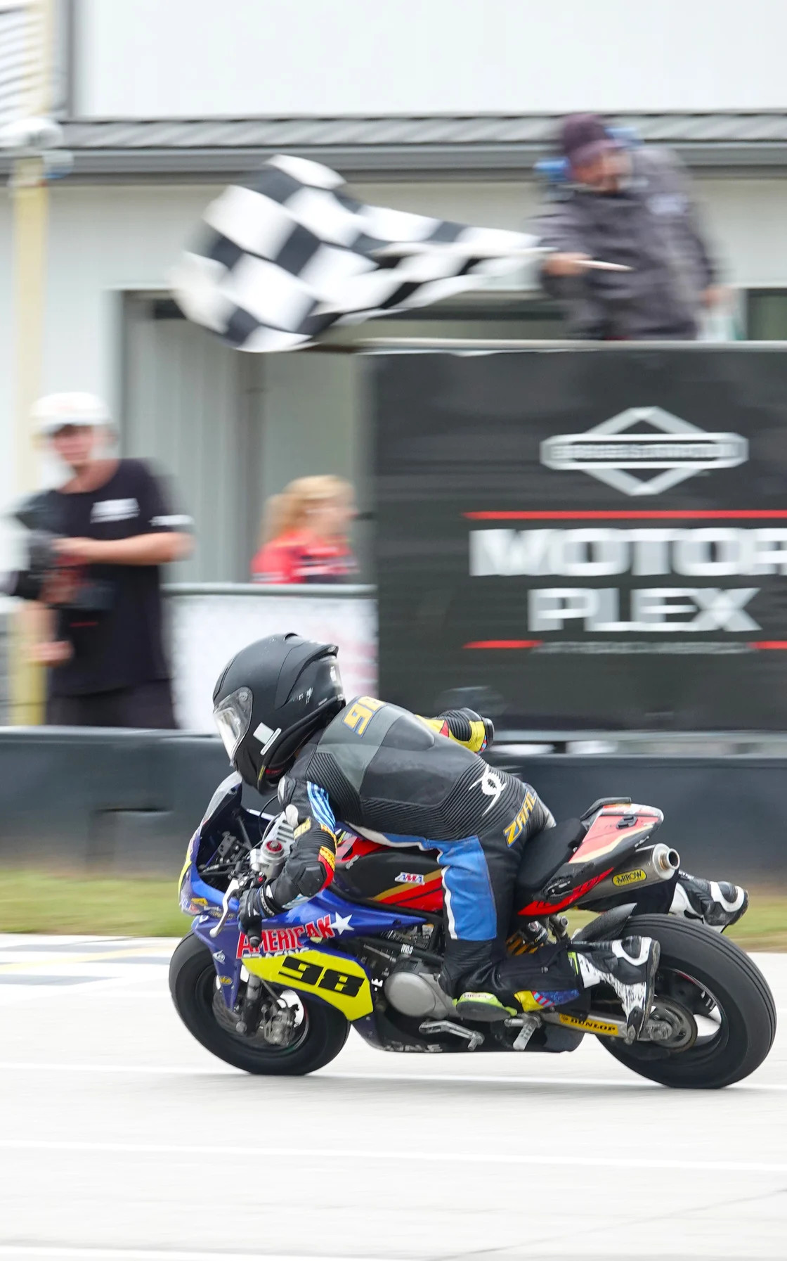 Zaal Farhand does a Superman across the finish line. Farhand was the only two-class winner in this year’s championships, taking both the GP 110 and GP 160 titles. Photo by Larry Lawrence