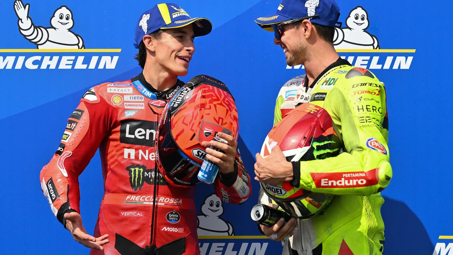 Marc Marquez, on the left, and Fabio Di Giannantonio, on the right,, in parc ferné after MotoGP qualifying session. Photo courtesy Dorna.