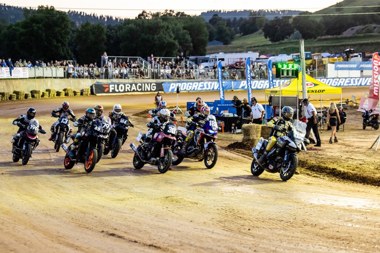 Dan Bromley (62) leads the pack during the AFT AdventureTracker Main Event during Round 11 in Sturgis Tuesday night. Photo by Tim Lester/ courtesy American Flat Track