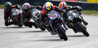 Kensei Matsudaira (74) made a dramatic last-lap pass on Mahdi Salem (10) to win the first GP190 race on Saturday. The two crashed together in race two, opening the way for Connor Raymond (44) to take the victory. Photo by Larry Lawrence