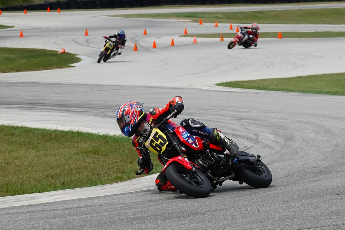 In an off-weekend from the MotoAmerica Talent Cup, Bodie Paige (65) raced during the Mini Cup National Finals weekend to stay sharp. He ran off and hid in the first SteetGP class race. Photo by Larry Lawrence