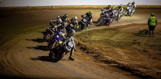 AFT: AdventureTrackers Championship To Be Decided at Peoria TT Dan Bromley (62) leads the AFT AdventureTrackers class Tuesday night at the Jackpine Gypsies MC in Sturgis during Round 11 Photo by Scott Hunter / courtesy American Flat Track