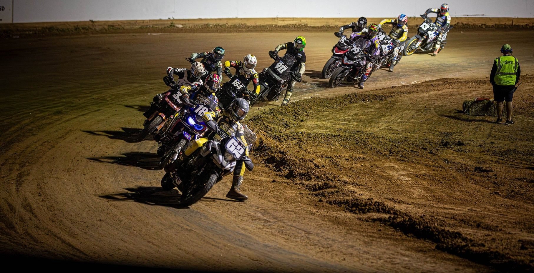 Dan Bromley (62) leads the AFT AdventureTrackers class Tuesday night at the Jackpine Gypsies MC in Sturgis during Round 11 Photo by Scott Hunter / courtesy American Flat Track