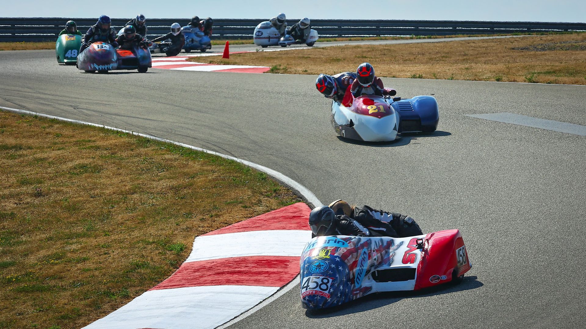 Sidecar racing: Sean Stivason/Susan Stivason (458), Bernard Juchli/Kevin Kautzky (21), Damon Doherty/Melissa Kellam (13A), Paul Koehler/Andrea Blake (48) and Brian Woods/Renee Bove (96). Photo Credit Etechphoto