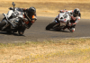 Stuman Chasing another rider. Both riders on BMW S 1000 RR motorcycles. Photo credit GotBlueMilk photography