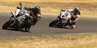 Stuman Chasing another rider. Both riders on BMW S 1000 RR motorcycles. Photo credit GotBlueMilk photography
