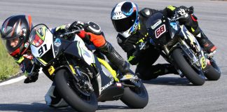Early in the opening of three Motul MiniGP Canadian National races, Ethan Reardon leads Championship rival Jager Stockill – they would battle for first in each of the final events of the 2025 Canadian campagin, and will represent their country together in Spain this November. Photo courtesy Colin Fraser