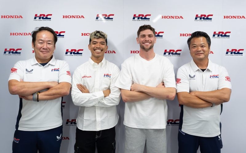 From left to right, Yuzuru Ishikawa (HRC Executive Director), Somkiat Chantra, Jake Dixon and Taichi Honda (HRC General Manager). Photo courtesy HRC.