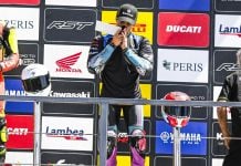 Julian Correa on the podium at Circuito de Navarra, in Spain. Photo by Life be Lucky Photography