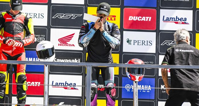 Julian Correa on the podium at Circuito de Navarra, in Spain. Photo by Life be Lucky Photography