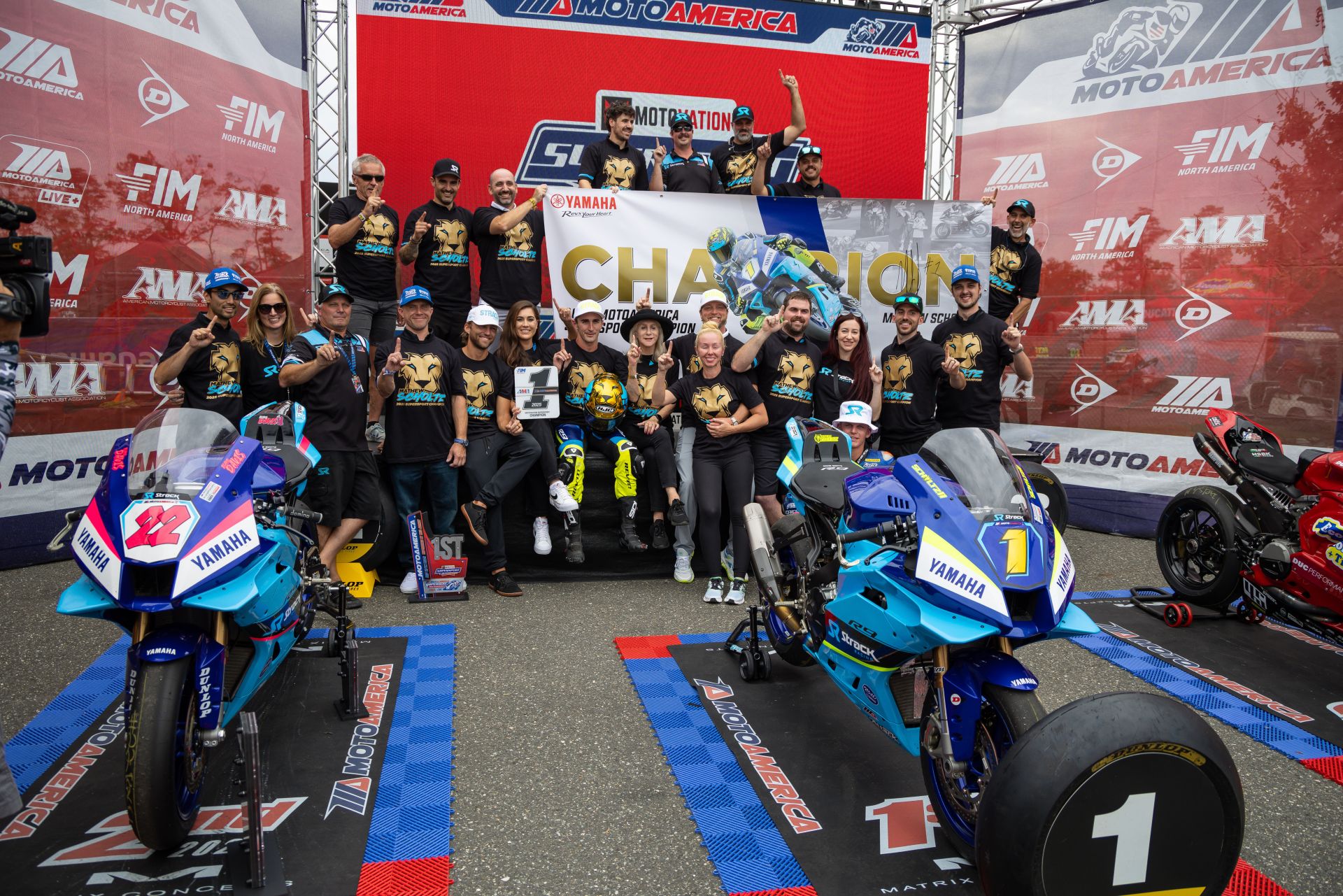 Mathew Scholtz and the entire Strack Racing crew celebrate in style after clinching the MotoAmerica Supersport Championship. Photo courtesy Yamaha Motor Corporation. 