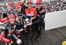 The team celebrates on balcony [l-r] Etienne Masson, Dan Linfoot, Gregg Black, Yohei Kato, Damien Saulnier. Photo courtesy SERT Team.