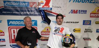 Dallas Daniels (32) celebrates after receiving his Championship #1 plate from Mike Burkeen (American Motorcyclist Association) at Lake Ozark Speedway Saturday night. Photo by Tim Lester / courtesy American Flat Track.