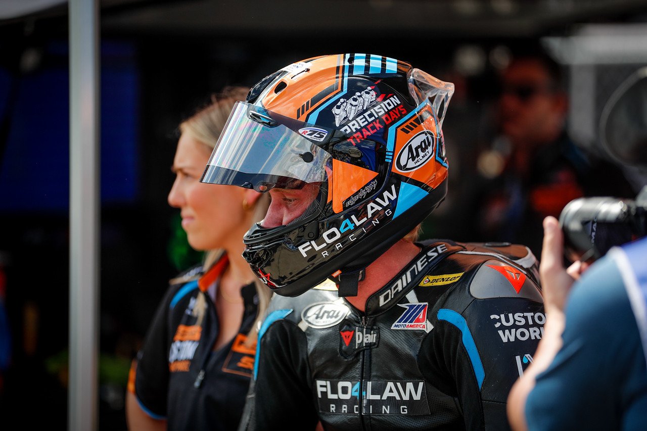 Mr. Smith and his Flo4Law Racing team—including Smith’s girlfriend Cassandra Melnick keeping a watchful eye in the background—are excited about the new partnership with David Anthony and ADR Motorsports. Photo courtesy of Benjamin Smith.