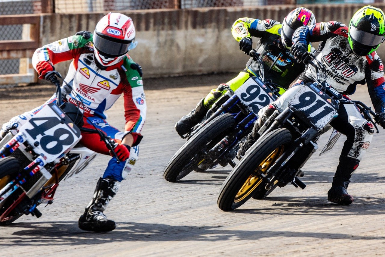 Trent Lowe (48) leads Henry Wiles (911) and Brandon Price (92) during the Mission AFT SuperTwins Main Event Sunday at the Springfield Mile II presented by Drag Specialties event. Photo credit Tim Lester / courtesy American Flat Track.