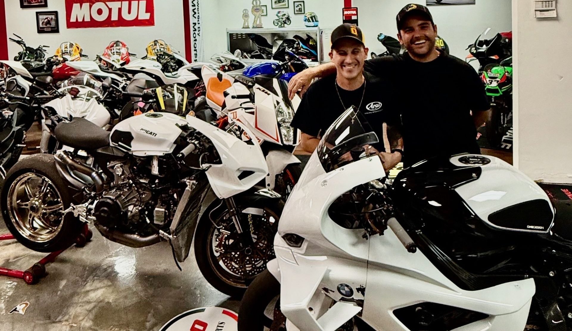 TopPro Motorsports owner Alex Arango (left) welcomes veteran rider and good friend Stefano Mesa (right) to the team as Mesa makes his comeback in Stock 1000 next weekend aboard a BMW M 1000 RR. Photo courtesy of Stefano Mesa.