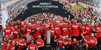 Marc Márquez marks his return to the top of MotoGP by clinching the 2025 World Championship, celebrating with his Ducati team. Photo courtesy Dorna.