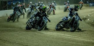 Mission AFT SuperTwins riders Dallas Daniels (32), Henry Wiles (911), Briar Bauman (3), Davis Fisher (67), and others race during the Round Two Main Event at the 2025 Daytona Short Track II. Photo by Tim Lester / courtesy American Flat Track.