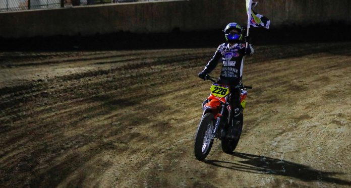 Kage Tadman (228) takes a victory lap at Ventura Raceway during Round 4. Photo credit: Scott Hunter / courtesy American Flat Track
